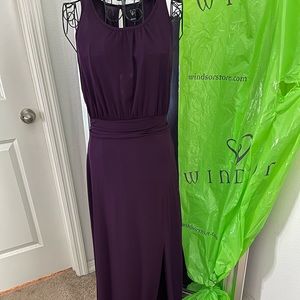 Formal, long split sleeveless dress.
